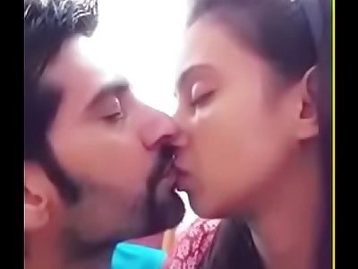Indian newly married couple smooch